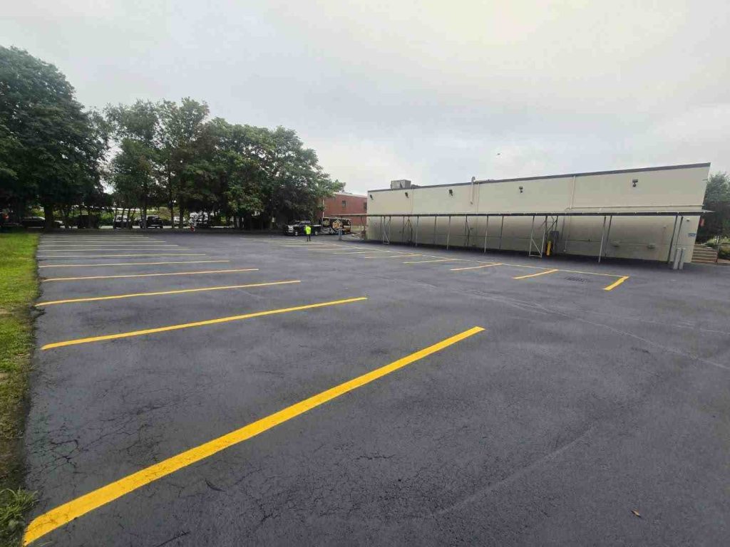 Empty parking lot with freshly painted lines.