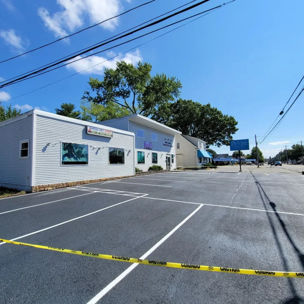 Line striping machine applying thermoplastic materials on a roadway