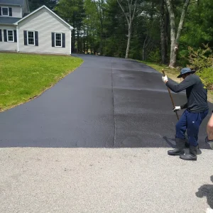 how long should i wait to sealcoat a brand new asphalt driveway in ri